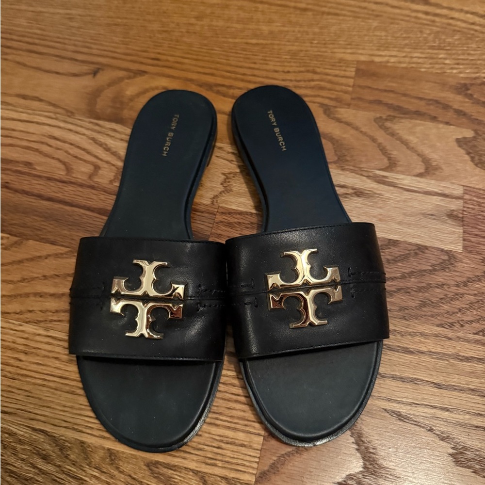 Black Tory Burch slides in size 9.5